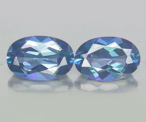 2 piezas de topacio azul azotico natural a juego con brillo superior, peso total de 1,12 quilates