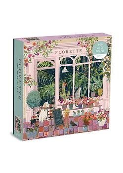 Fint pussel som föreställer en blombutik i en rosa nyans, med olika växter, en katt och en hund. 