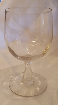 Innkeeper's glass of red wine optically blown