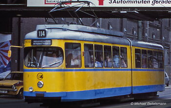 Tram Duewag GT6, one front light, yellow/blue livery "Essen", ep. IV-V