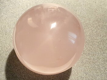 Star rose quartz ball diam. approx. 7,5cm. Madagskar (incl. stand)