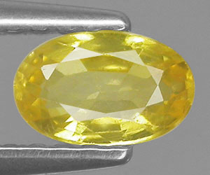 0.54 ct underbart vacker oval slipad naturlig gul safir ädelsten