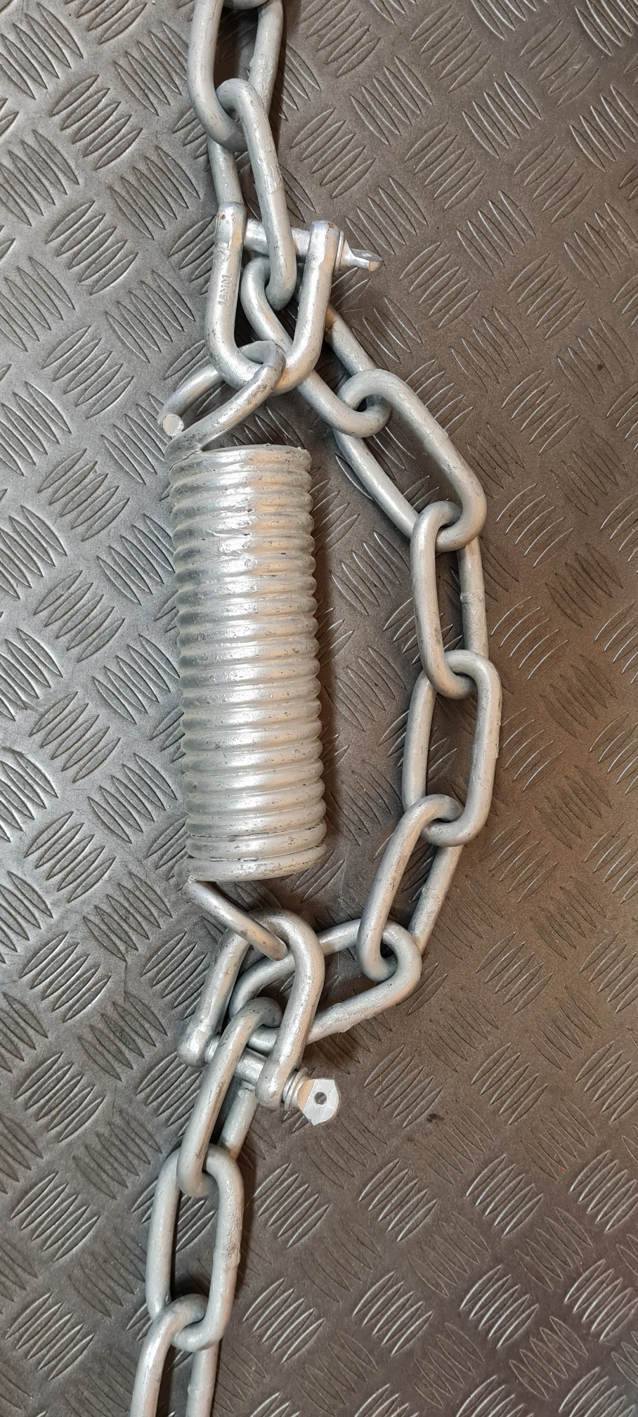 Ryckutjämnande stålfjäder 10mm