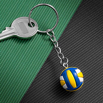 Volleyboll-Nyckelring på bordet