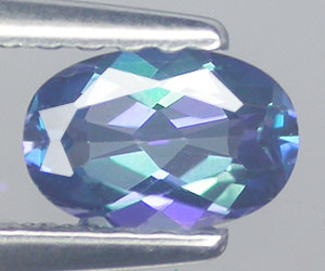 5.9x4mm oval natural azotic blue topaz gemstone