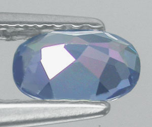 5.9x4mm oval natural azotic blue topaz gemstone - 2