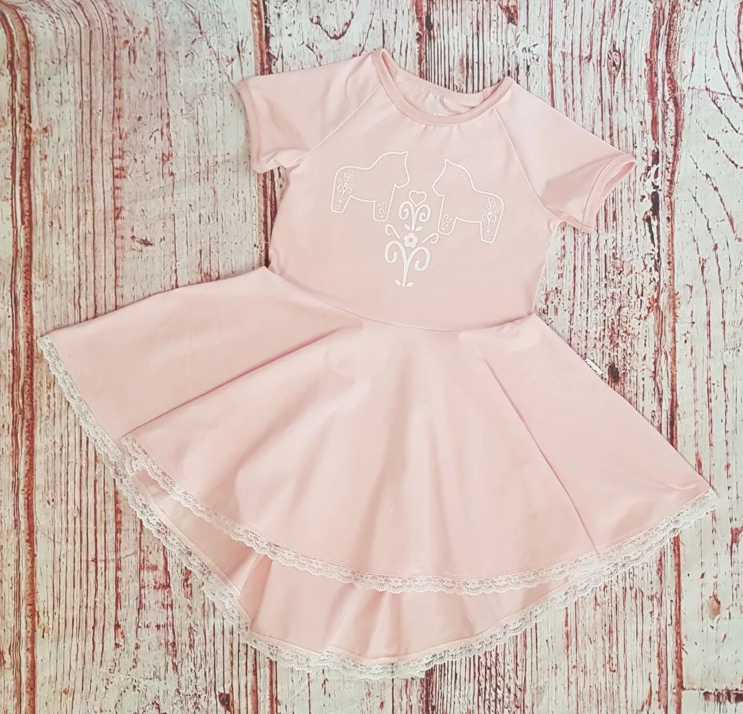 Peplum tunic med dalahästtryck