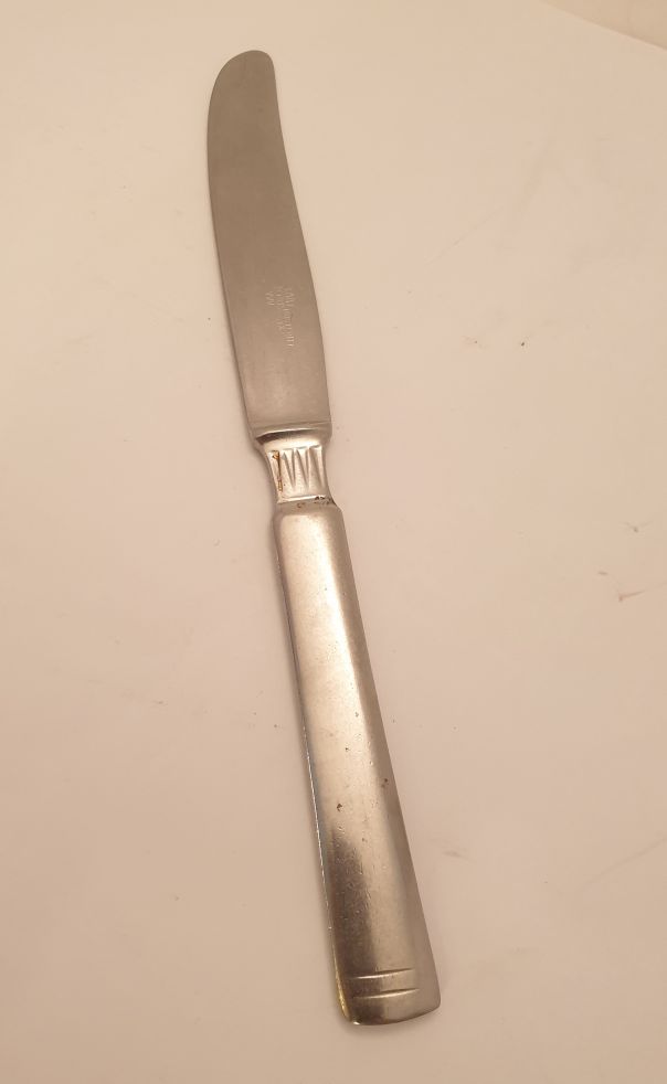 Lotus kniv bård upptill
