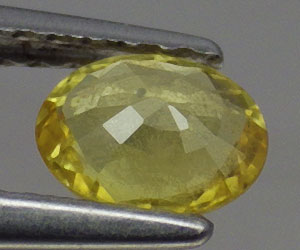 0.45 ct tjusig 5.5x4.7 mm oval slipad naturlig gul safir ädelsten - 2