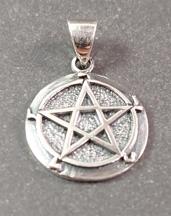 Pentagram med magiska Symboler