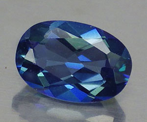 Hermoso topacio azul azotico natural ovalado de 6,2x4,2 mm con brillo superior - 3
