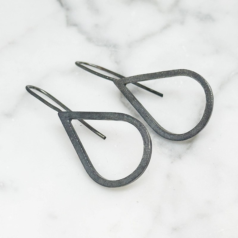 Silver earrings H2O oxidized