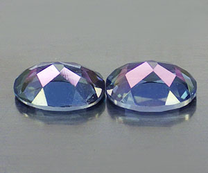 Topacio azul azotico ovalado de 6x4 mm calibrado a juego, peso total 1,20 ct - 2