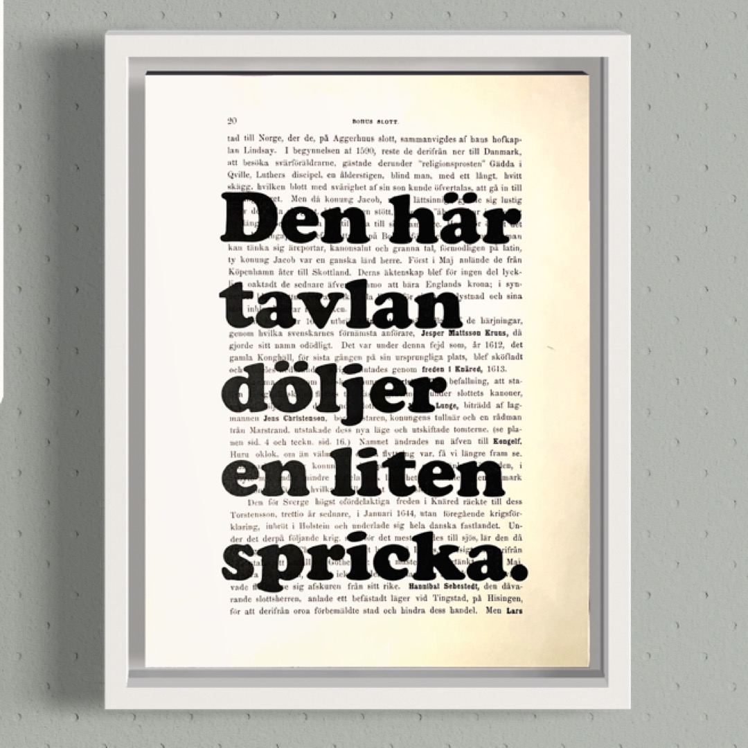 Tavla med texten Den här tavlan döljer en liten spricka.