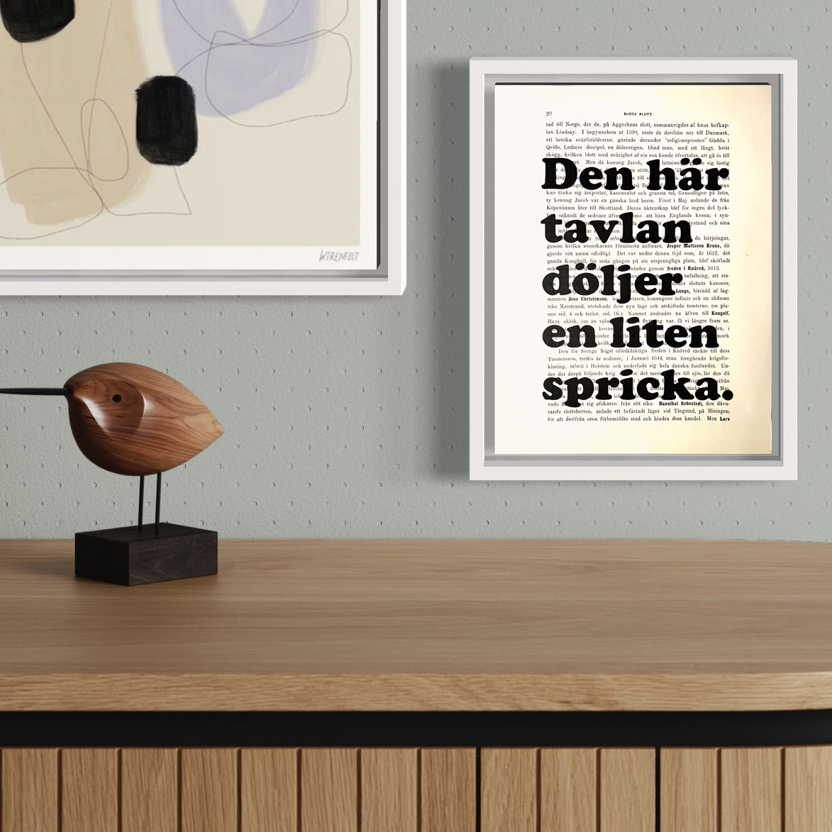 Tavla med texten Den här tavlan döljer en liten spricka.