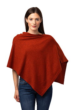  Liten Poncho, rostorange från 8design cashmere, säljs på Hospitalsgatan
