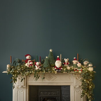 Jultomte Jolly mellan