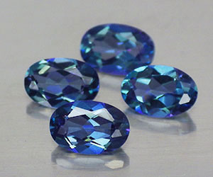 4 pcs 6x4 mm oval calibrated natural azotic blue topaz total weight 2.25 ct - 3