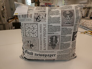 Kudde med tidningstryck