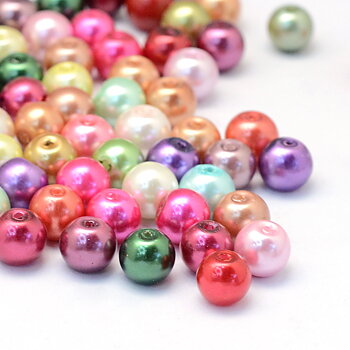 Glasvaxpärlor i mixade färger, runda 12 mm pärlor med 1 mm hål, visade i närbild på vit bakgrund. Pärlorna har en pärlemorskimrande yta i nyanser av rosa, grönt, lila, blått, guld och rött.