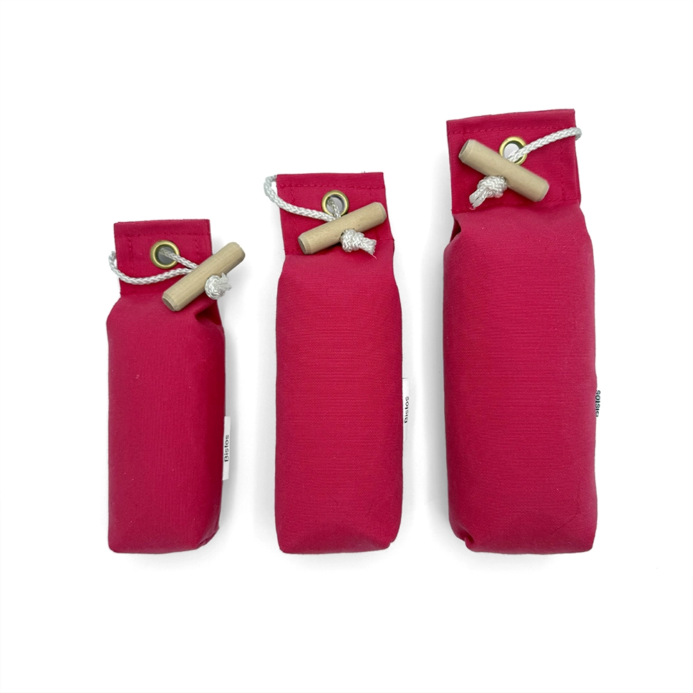 Pink dummy for dog training fetch water retrieving