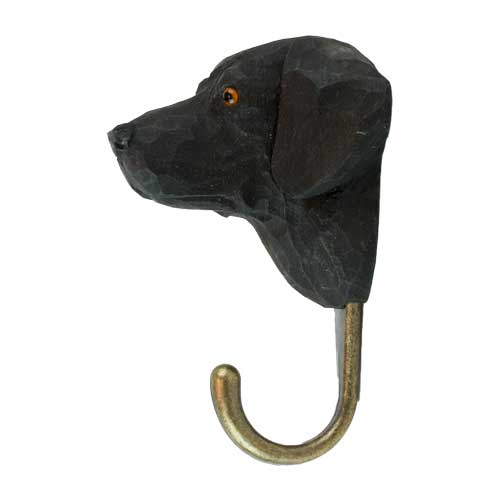 En handsnidad krok med motiv av en labrador retriever.