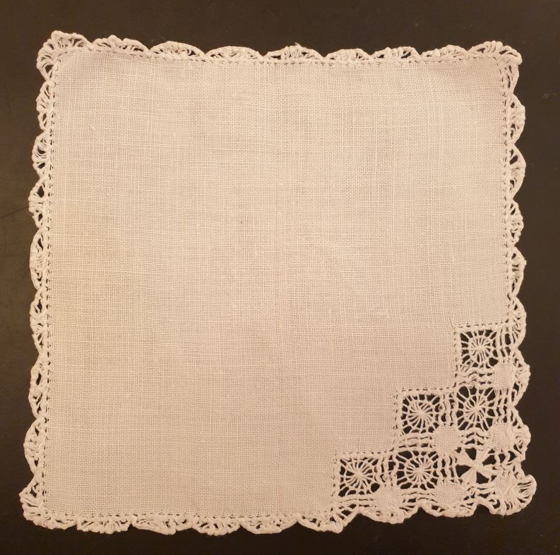 Small linen cloth with hole embroidery and thread lace trim