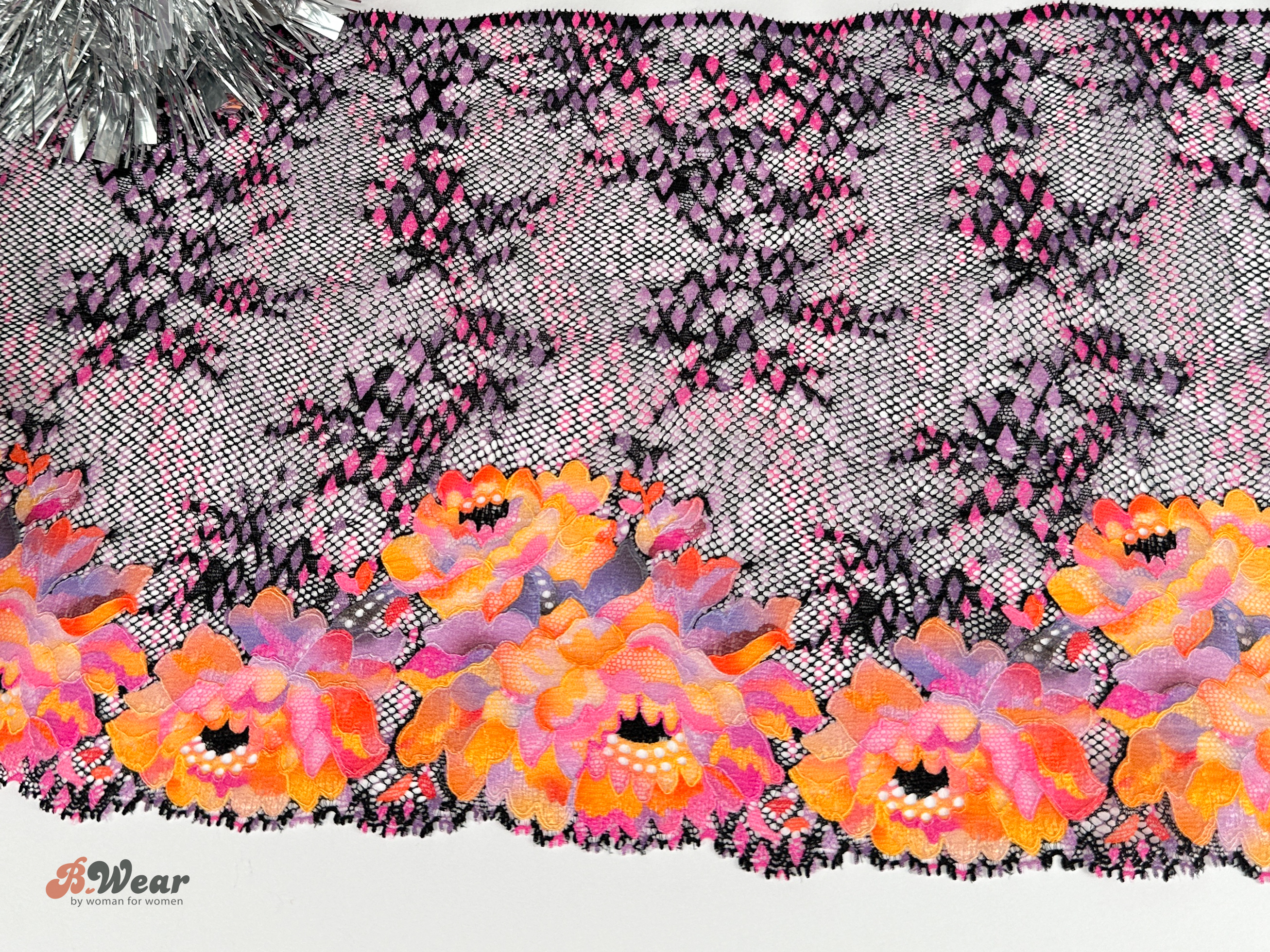 Lilacblack stretch lace with orange-purple flowers - 25 cm