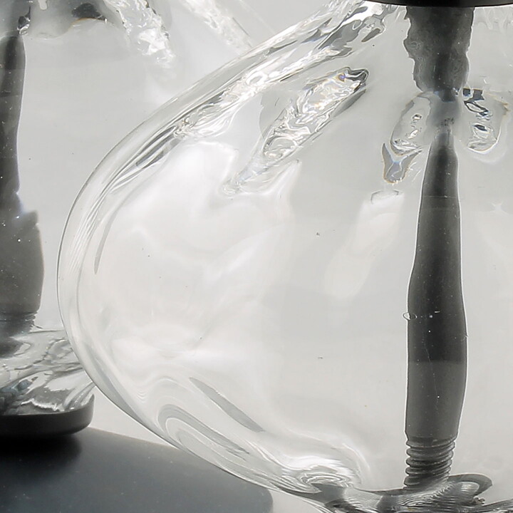Erik Höglund (1960s) Two Metal Candleholders with Clear Glass Sections 12 cm
