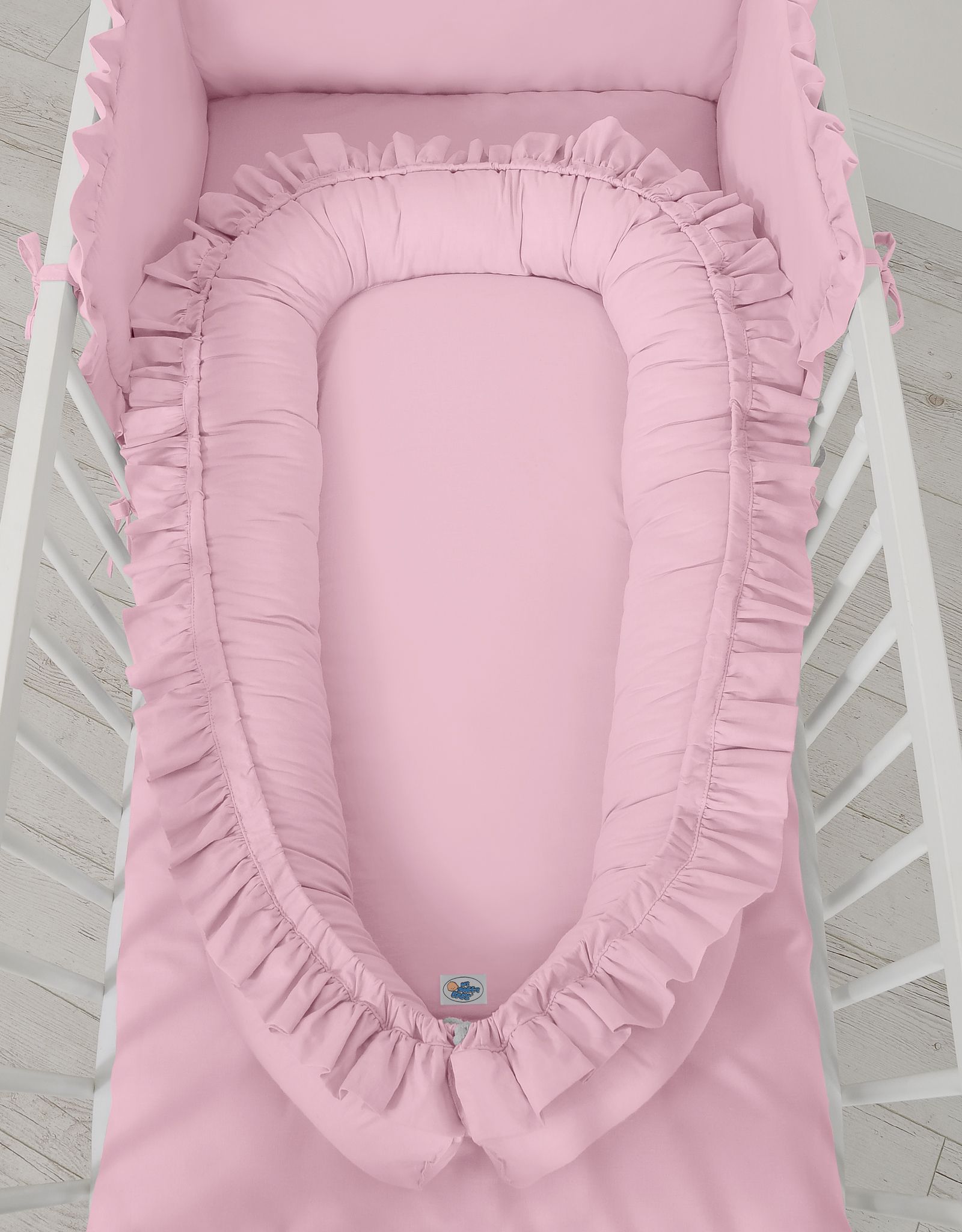 Premium Babynest Cocoon med volanger, Rosa