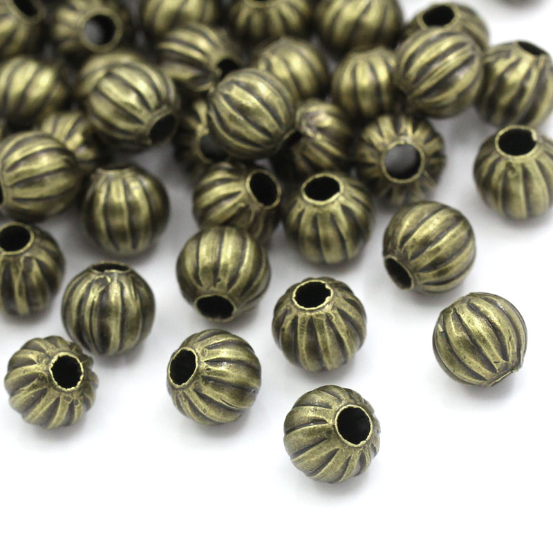 Spacer bead   Bronzr, Melon round - 2