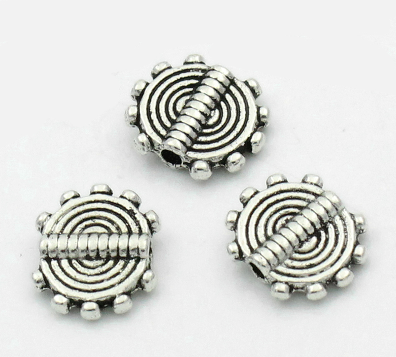 Spacer bead   Silver,   flatround carved