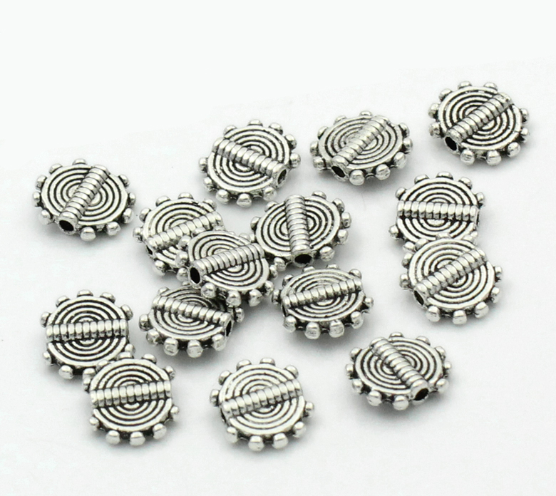 Spacer bead   Silver,   flatround carved - 2