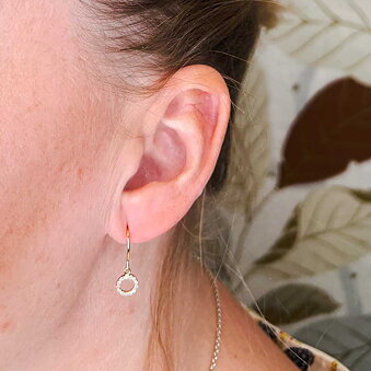 Gold earrings pendant with circle cz
