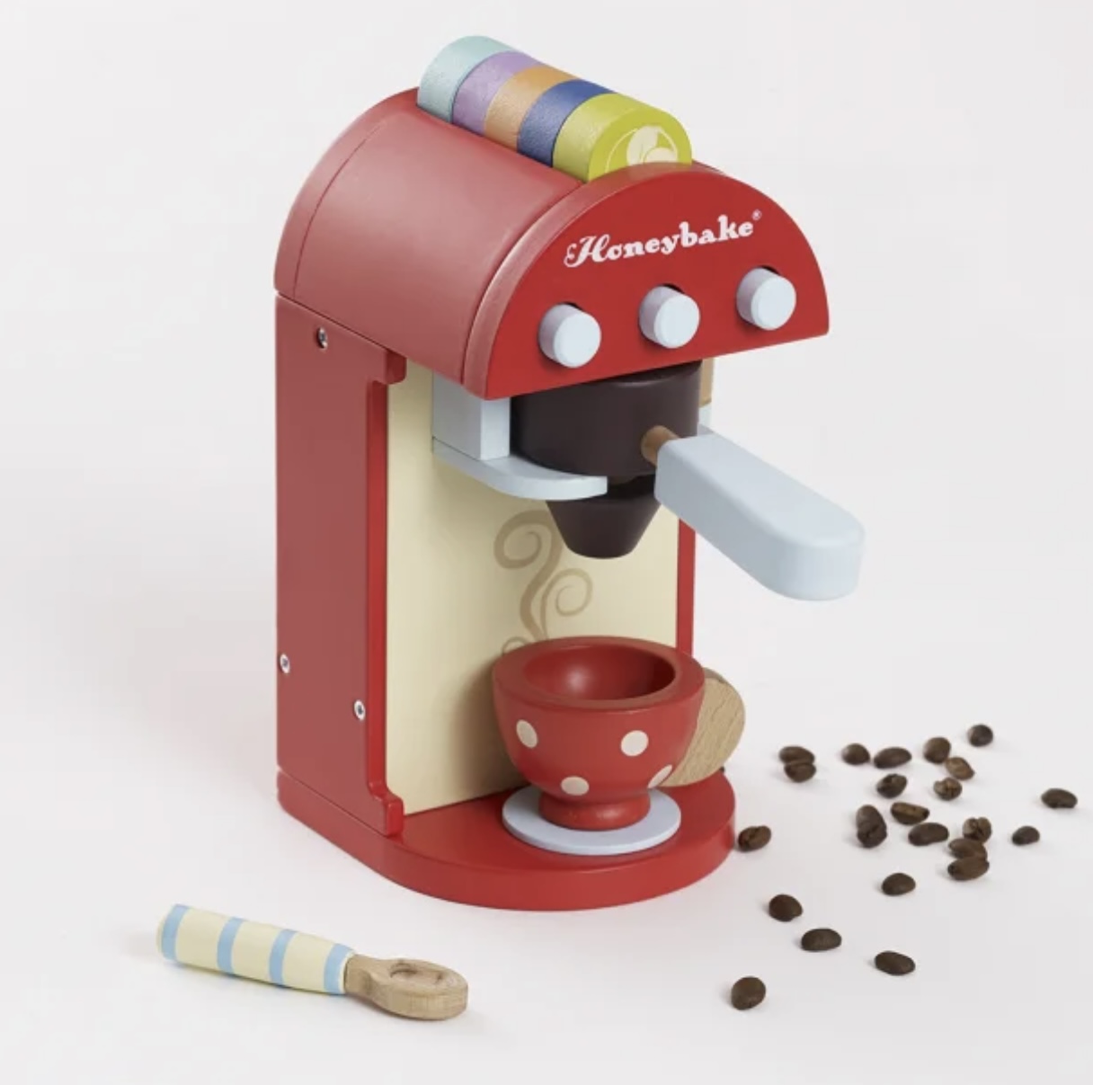 Espressomaskin med kaffekapslar för barn, tillverkad av trä. Honeybake