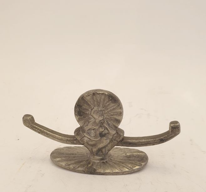 Knivlägg tenn dubbel figur med sol Stockholm 1932