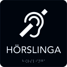 Taktil Skylt 150x150mm Hörslinga, svart med vit text text