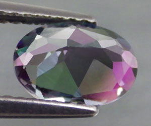Impresionante piedra preciosa de topacio místico natural ovalado de 1,39 ct - 2