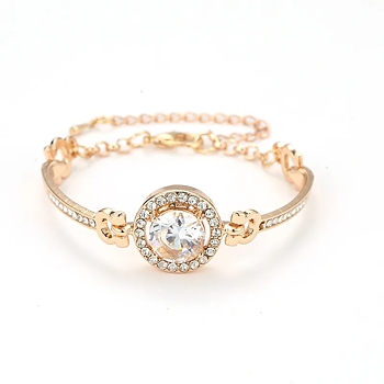 Armband "Hearts & Arrows" med en stor och många små stenar i Swiss CZ och 18K Guldplätering