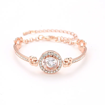 Armband "Hearts & Arrows" med en stor och många små stenar i Swiss CZ och 18K Roséguld plätering