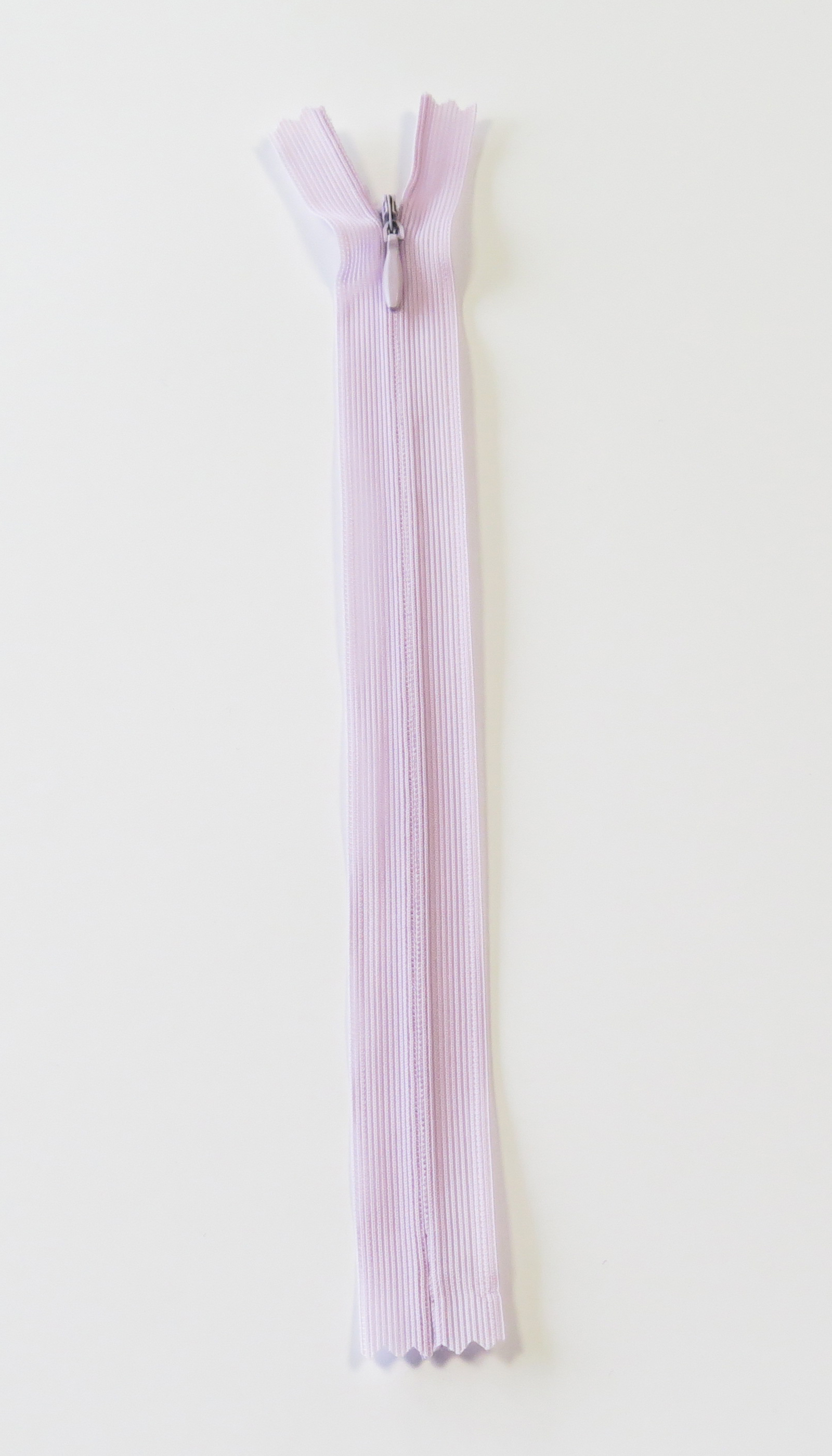 Osynlig Dragkedja - 11