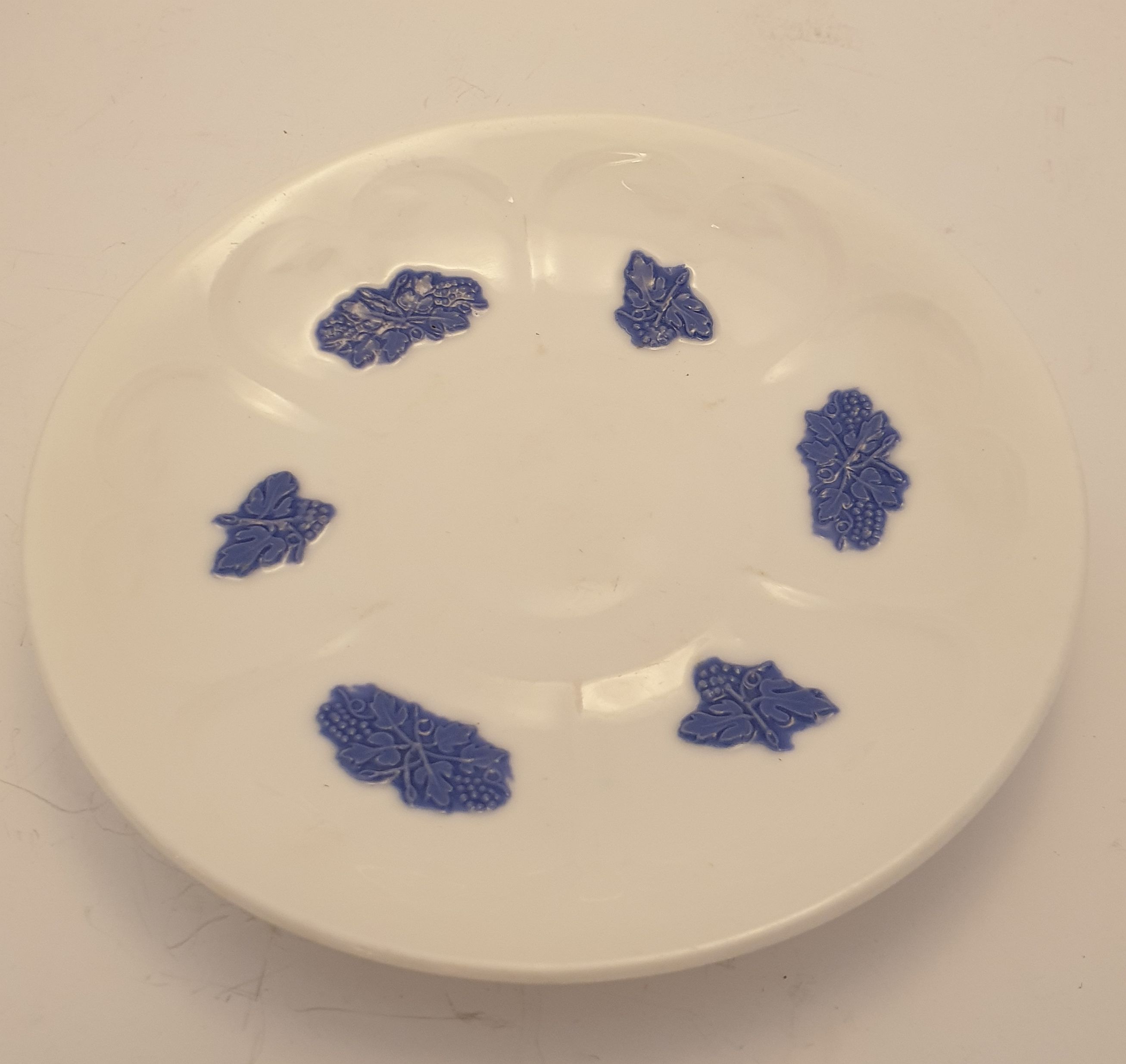 Blue flower coffee saucer, green stamp 1950s
