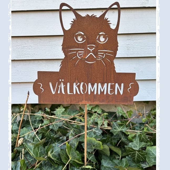 Skylt välkommen med katt i rost