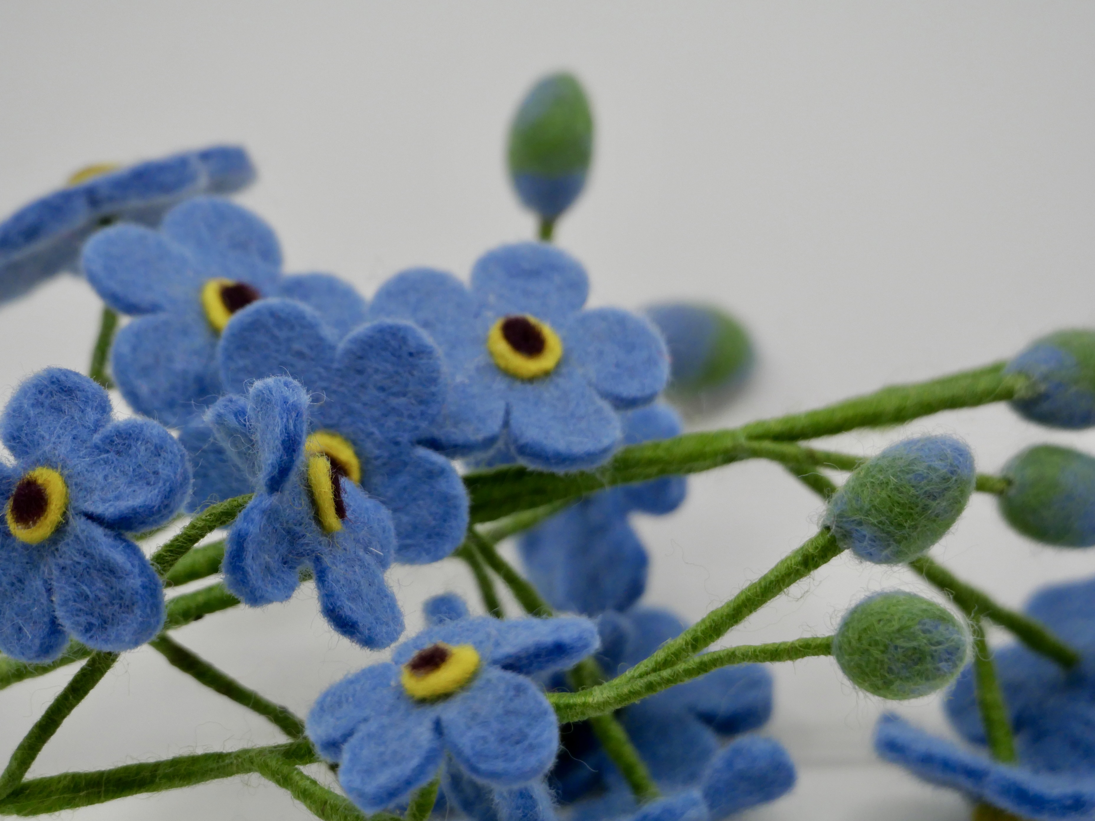 Blommor i tovad ull - 5