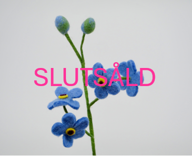 Blommor i tovad ull