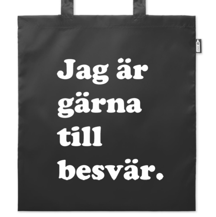Bild på tygkasse med texten Jag är gärna till besvär.