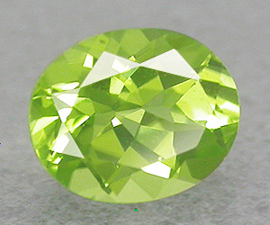 Hermosa piedra preciosa de peridoto natural ovalada de 0,70 ct de alta calidad. - 3