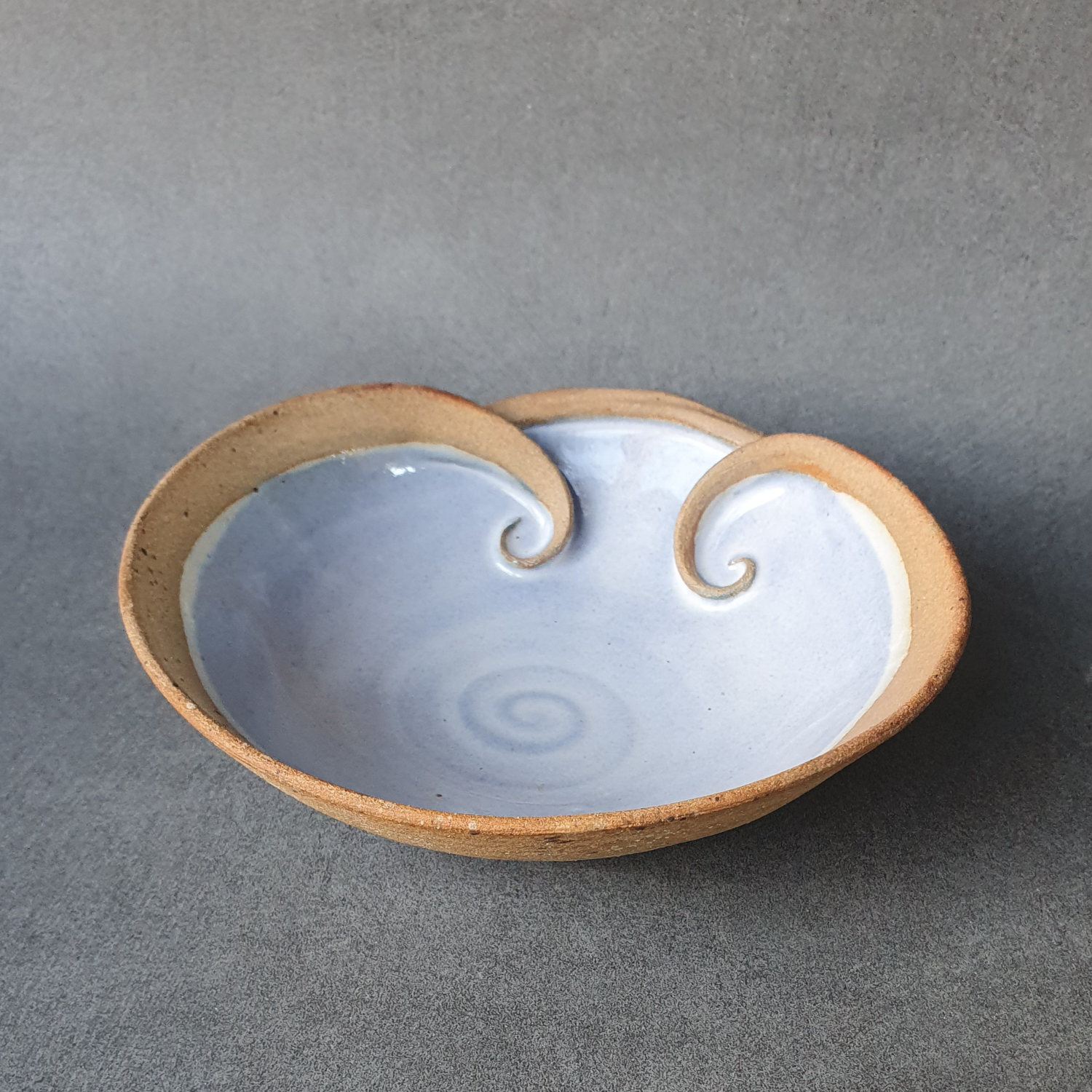 Flow bowl, pale blue with double swirls