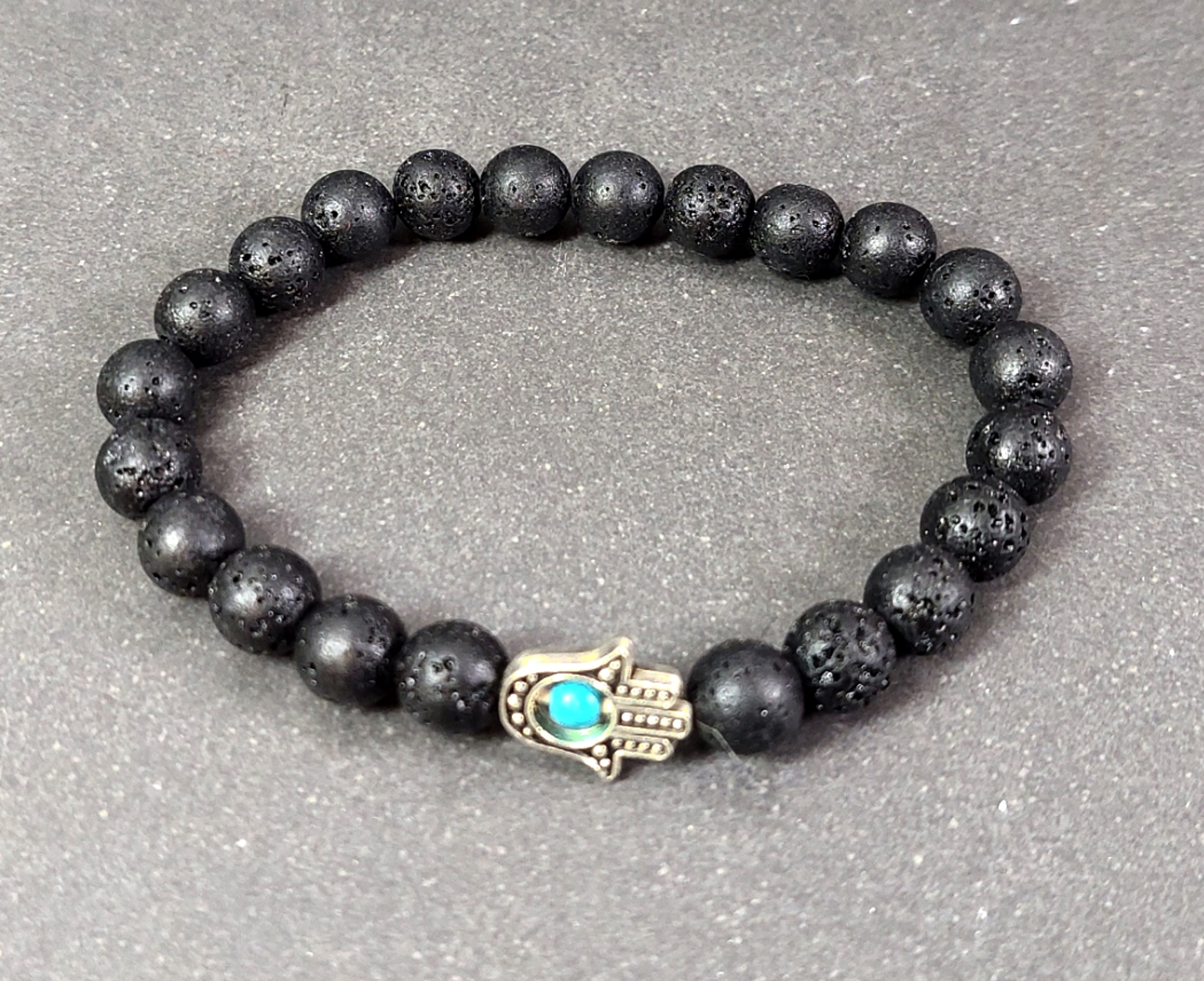 Armband - Lava Sten med Hamsa (Fatimas hand) Blå Pärla
