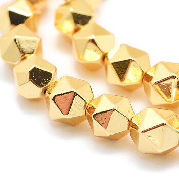 Hematit star cut guld 6 mm, 10 st kantiga syntetiska hematitpärlor med guldfärgad long life-plätering och hål ca 1 mm.